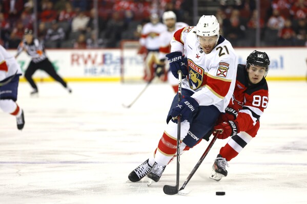 Cousins scores twice Panthers beats Devils 5 3 to spoil Green s